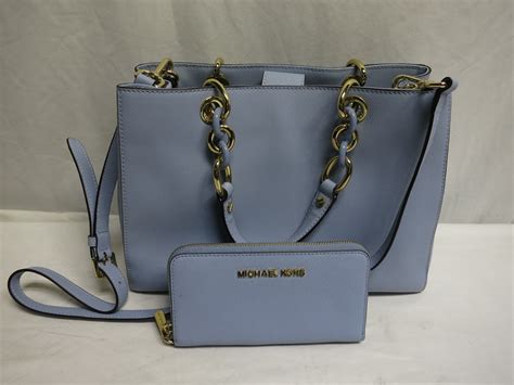 michael kors crossbody blue bag|Michael Kors light blue handbag.